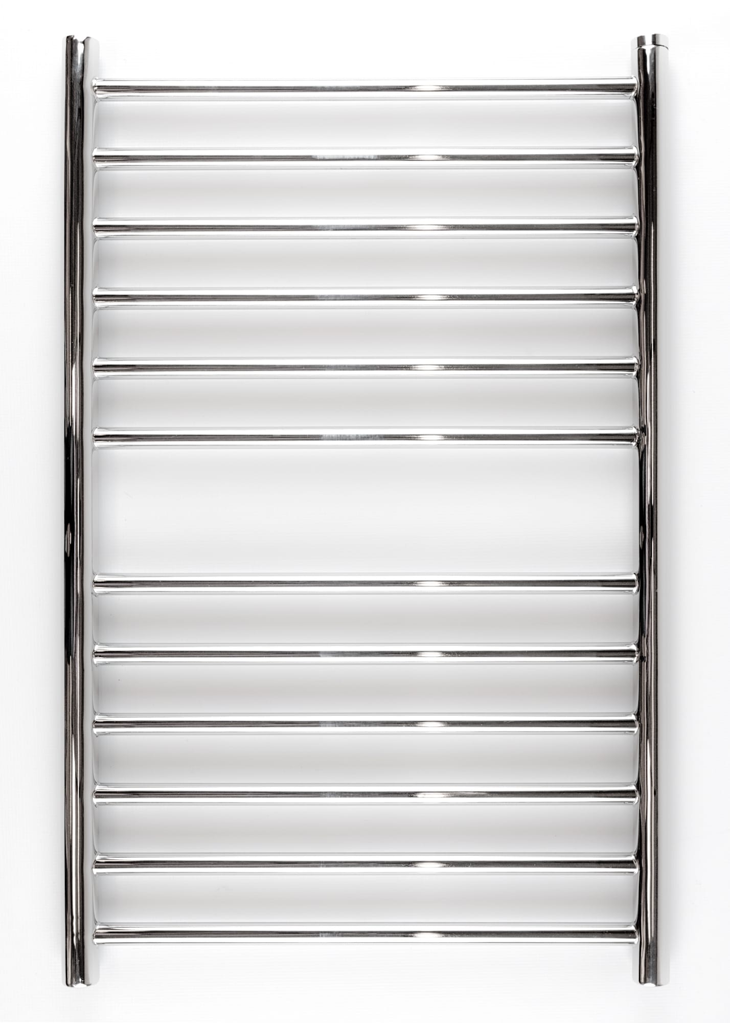 A polished chrome heated towel rail fixed to a plain white bathroom wall.