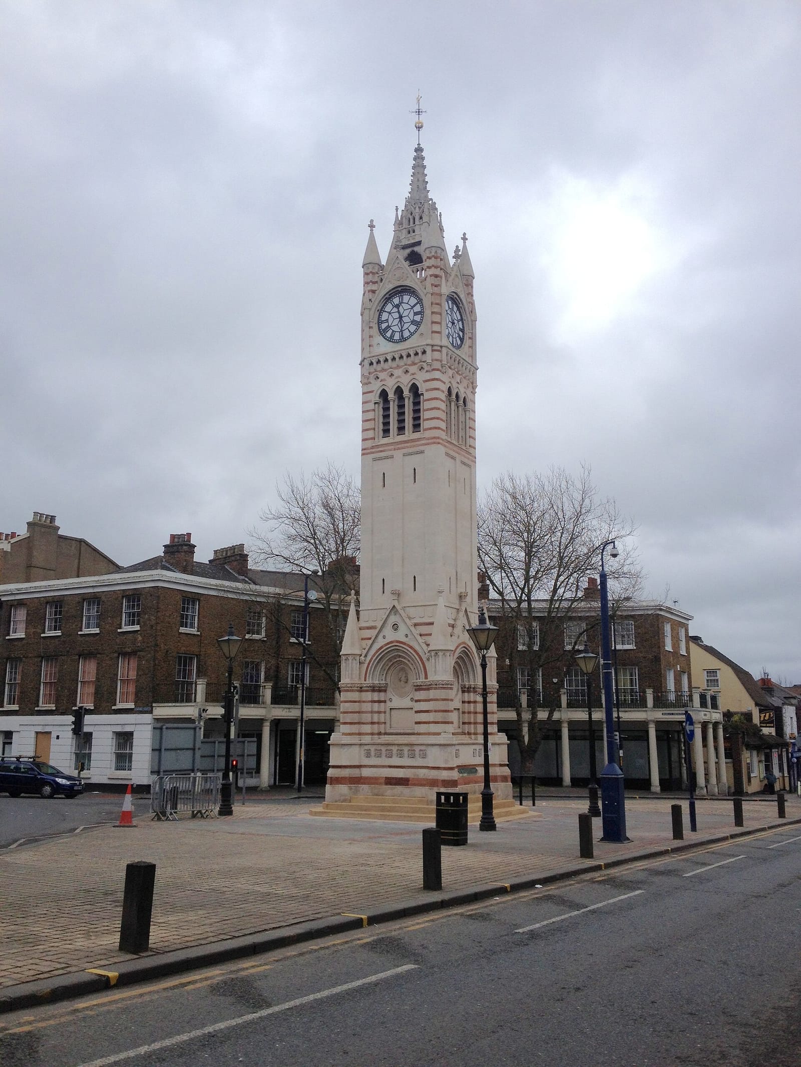 The Gravesend Clock Tower, a banded stone Victorian tower standing at the top of the pedestrianised high street.