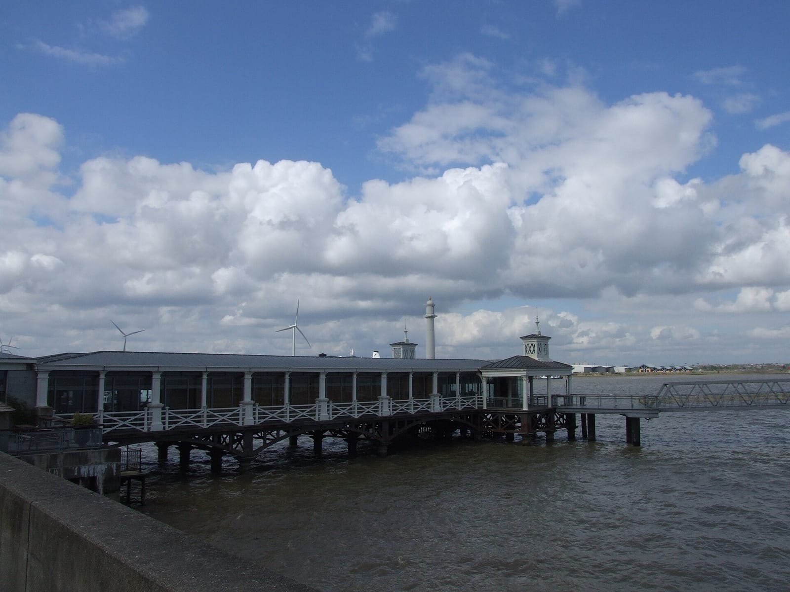 Gravesend Town Pier reaching out into the River Thames.